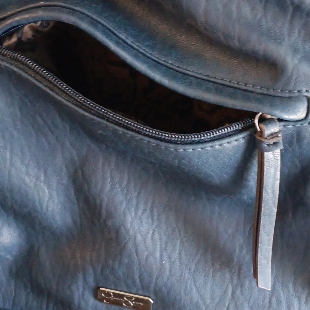 Jessica Simpson faux leather bucket hobo purse bag